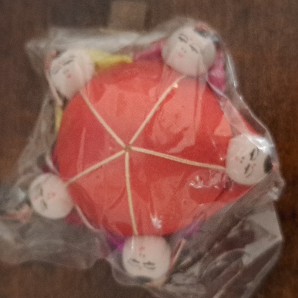 Vintage Chinese five person pin cushion
